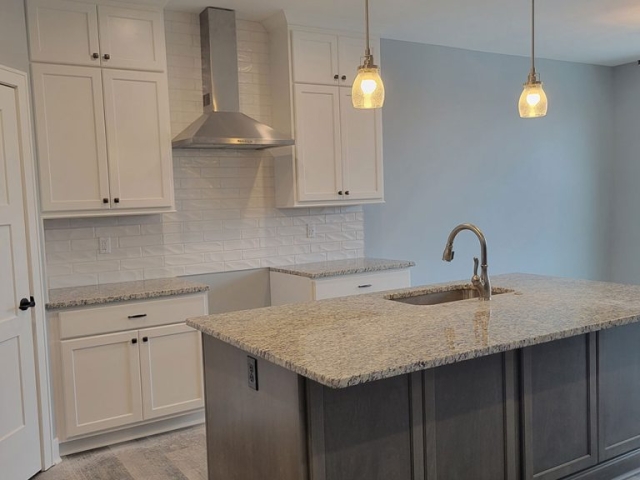 Tripp Kitchen white and grey cabinets